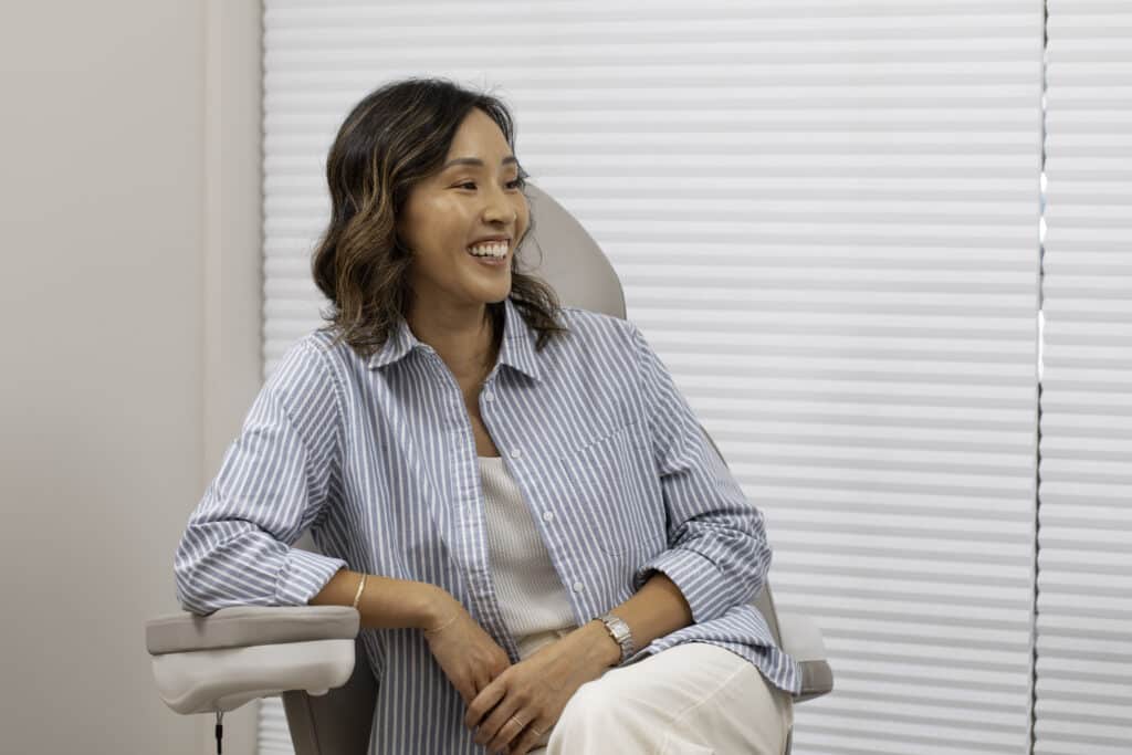 Happy patient in treatment chair