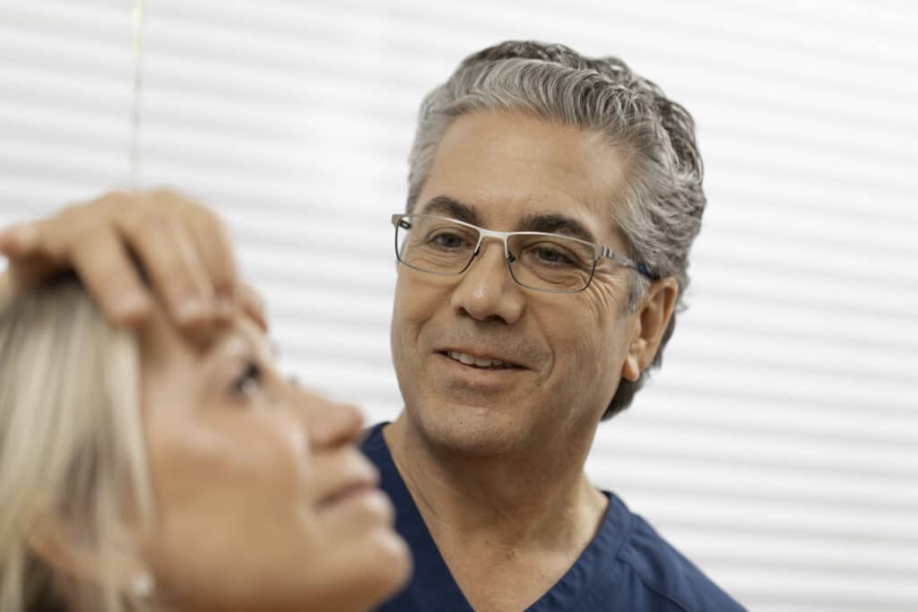 Dr. Ellis examining a patient