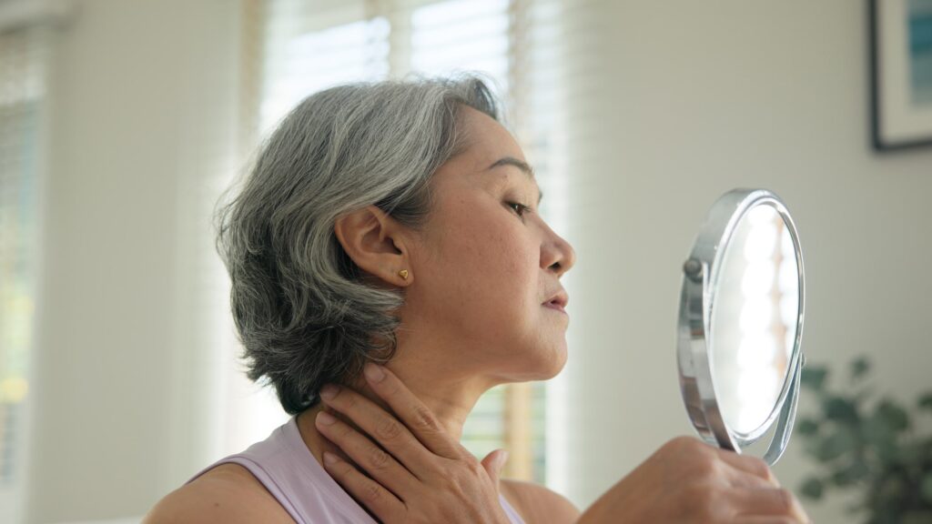 Female looking at a mirror