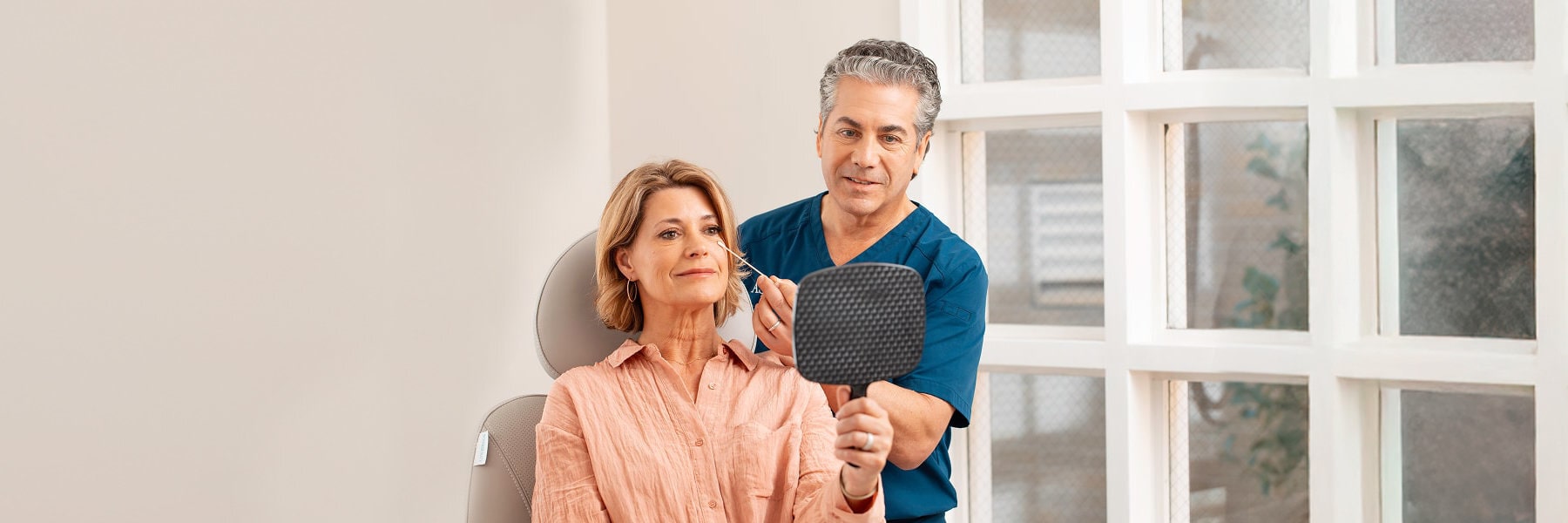 Dr. Potozkin with a patient during a consultation